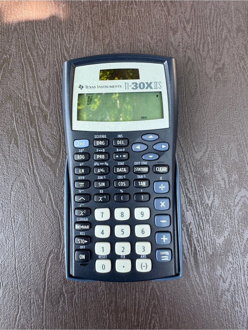 Texas Instruments Calculator in Navy Blue with White Keys